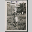 Photo of a toddler in a jacket and hat (ddr-densho-483-707)