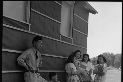 Japanese Americans standing in shade (ddr-densho-151-281)