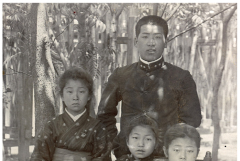 Portrait of four students at Nishinoda Elementary School (ddr-densho-494-39)