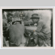 Three men sitting (ddr-densho-377-1640)