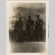 Three soldiers posing for photo with two young girls (ddr-densho-466-305)