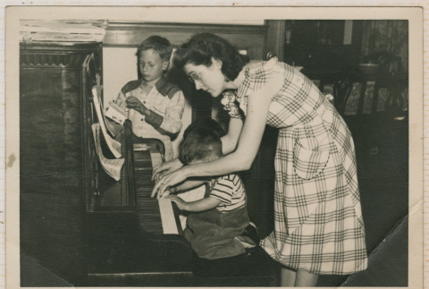 Betty teaching piano (ddr-densho-462-152)
