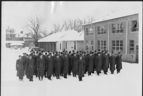 Men standing in formation in snow (ddr-densho-434-479)