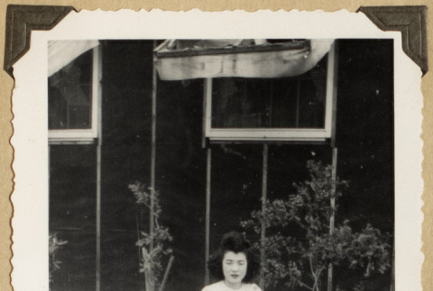 Shizuye Izuhara outside a barrack (ddr-densho-542-486)