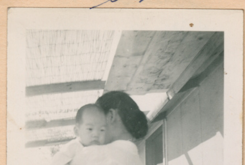 Woman holding baby (ddr-densho-329-1293)