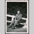 Soldier sitting on bench (ddr-densho-368-556)