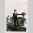 Soldier poses next to statue (ddr-densho-368-588)
