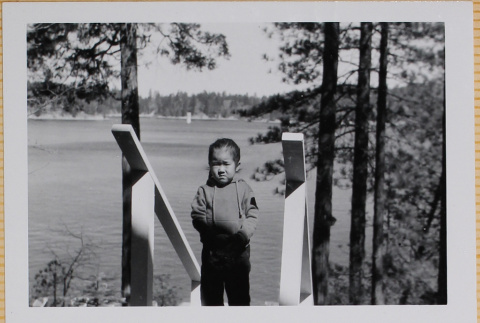 Child on steps to lake (ddr-densho-522-404)