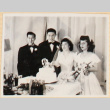 Bride and groom with maid of honor and best man (ddr-densho-522-46)