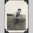 Man kneeling in field (ddr-densho-466-662)