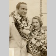 Buddy Rogers and Mary Pickford wearing leis (ddr-njpa-1-1133)