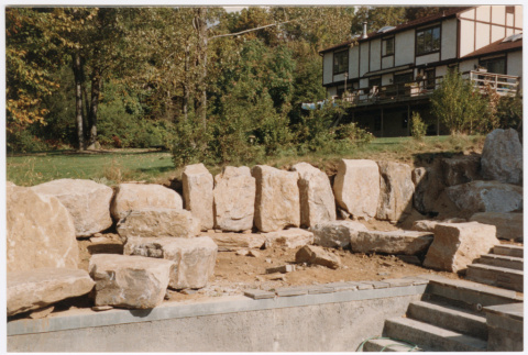 Rock feature under construction by stairs (ddr-densho-377-2392)