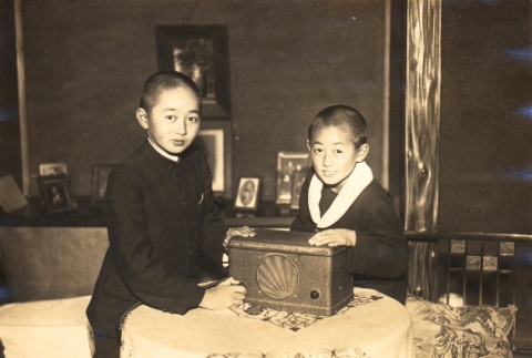 Two boys posing with a radio (ddr-njpa-4-2809)