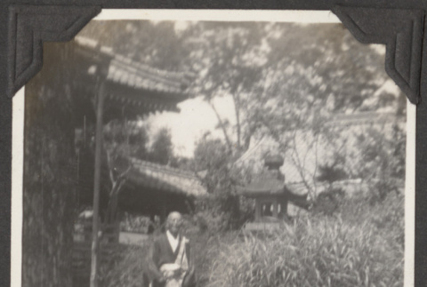 A man at a Japanese temple (ddr-densho-432-66)