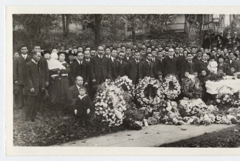 Attendees around coffin at Yuki Yasui's funeral (ddr-densho-259-637)