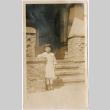 Girl standing by stone steps (ddr-densho-426-1960)