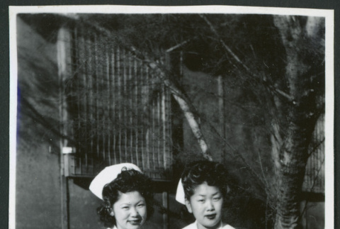 Photograph of nurses posing in front of the Manzanar hospital (ddr-csujad-47-200)