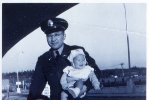 Soldier with two children (ddr-densho-1007-723)
