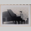 Betty playing piano (ddr-densho-462-270)