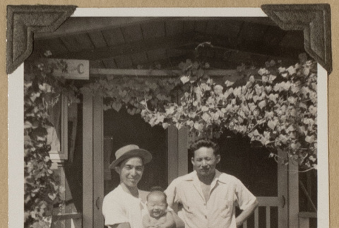 Two men with a baby (ddr-densho-542-441)