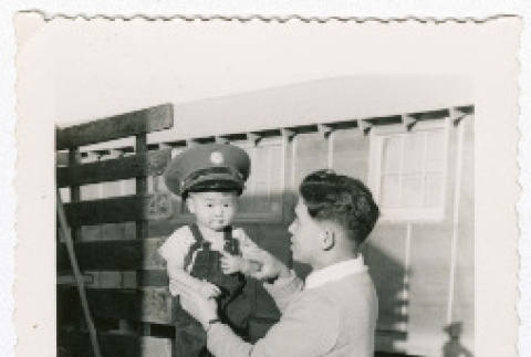 Kay Kubota wearing Tak Kubota's army hat (ddr-densho-544-1)