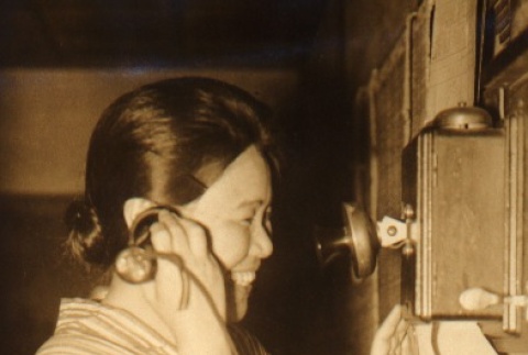 Shuhei Nishida's fiancee on the phone (ddr-njpa-4-1434)