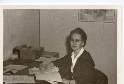 Woman at desk (ddr-hmwf-1-28)