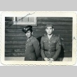 Two soldiers in front of a building (ddr-densho-22-172)