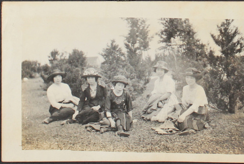 Five women seated in a park (ddr-densho-278-95)