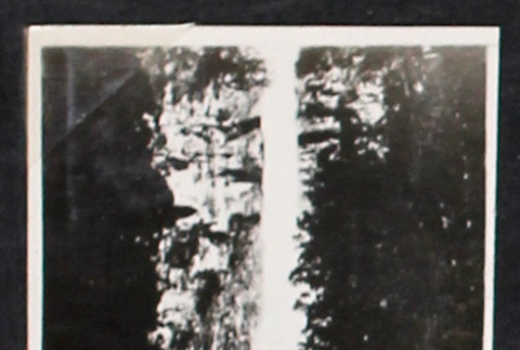 Waterfall over a rocky cliff (ddr-densho-404-121)