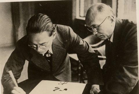Wang Jingwei doing calligraphy (ddr-njpa-1-1038)