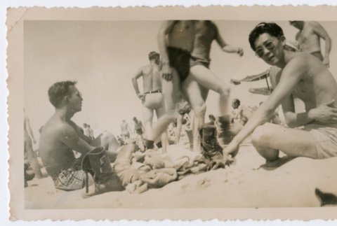 Men sitting on beach (ddr-densho-368-121)