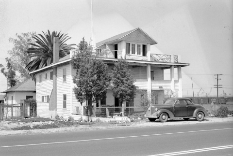 Three story building labeled East San Pedro Tract 064 (ddr-csujad-43-86)