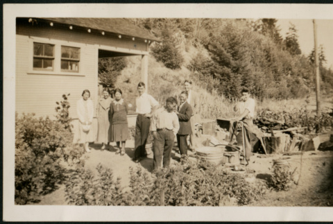 Japanese Americans in front of house (ddr-densho-359-250)