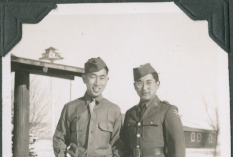 Two men standing in snow. Joe Iwataki on left. (ddr-ajah-2-469)
