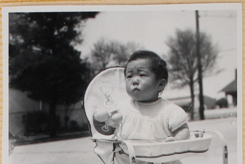 Susan Shiomi in bouncy chair (ddr-densho-522-151)
