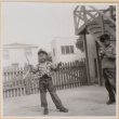 William Shiomi with bow and arrow (ddr-densho-522-284)