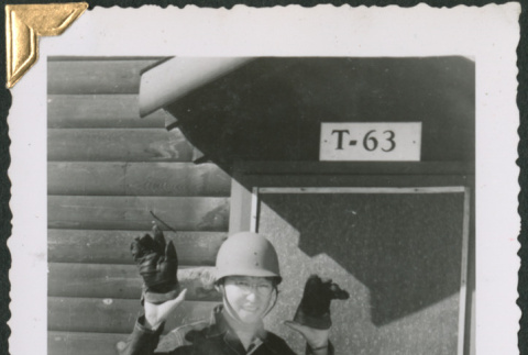Man holding gloves (ddr-densho-434-338)