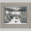 Group portrait on men and one woman seated around long table (ddr-densho-410-394)
