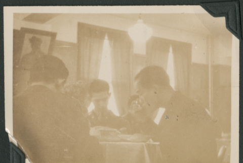 Nisei soldiers at a meal (ddr-densho-397-266)