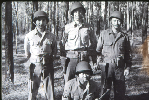 Four soldiers in forest (ddr-densho-1007-1338)