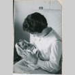 Woman holding baby (ddr-densho-523-402)