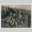 Kids in dirt pile (ddr-densho-378-1131)