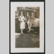 woman and child next to a car (ddr-densho-378-807)