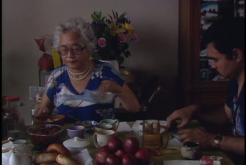 Iijima family eating lunch (ddr-densho-1007-1530)