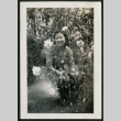 Woman poses in garden (ddr-densho-359-1009)