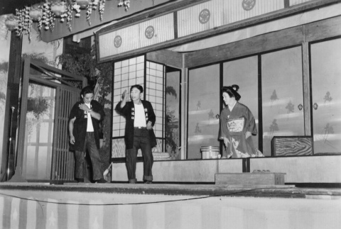Three people on stage in costume (ddr-ajah-3-317)