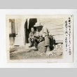 Kenneth Kenji Kuwahara and George Naohara crushing coals at a hospital (ddr-csujad-38-71)