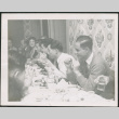 Group of men and women around table (ddr-densho-293-164)