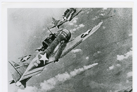 SBD dive bombers during Battle of Midway (ddr-densho-1007-85)